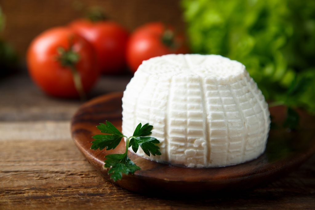 Ricotta on a wooden plate | featured image for Home.