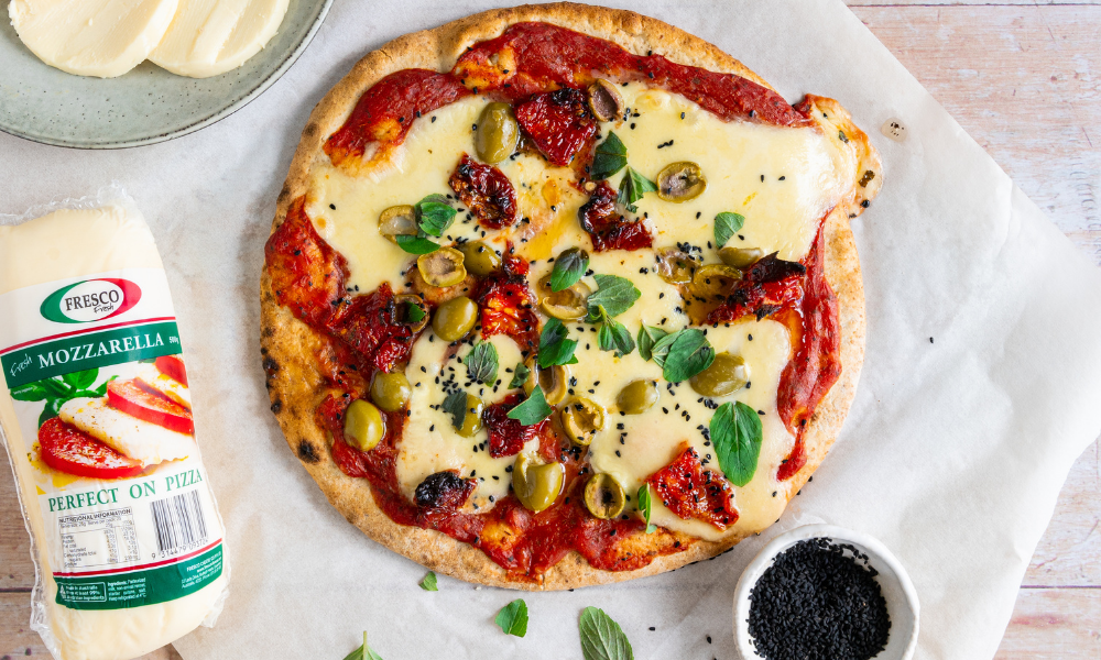 Mozzarella Pizza using Fresco's Fresh Mozzarella Cheese | Featured image for Fresh Mozzarella Cheese – Fresh Mozzarella Cheese Landing Page for Fresco Cheese.