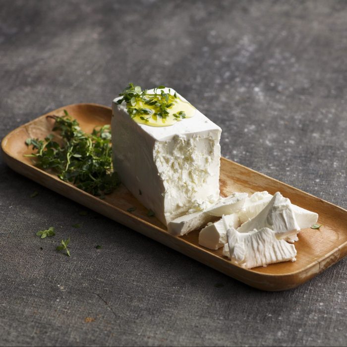 A block of fetta with thyme. | Featured image for Fresco Cheese.