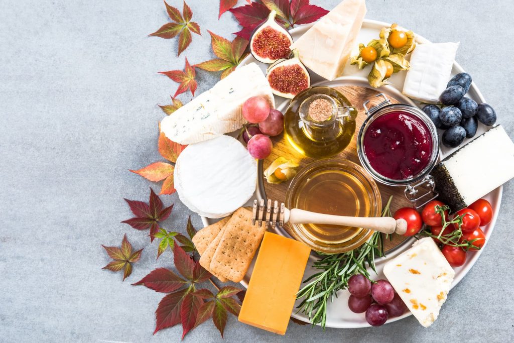 Cheese and fruit platter | Featured image for Cheese Terminology – A Beginners Guide Blog at Fresco Cheese.