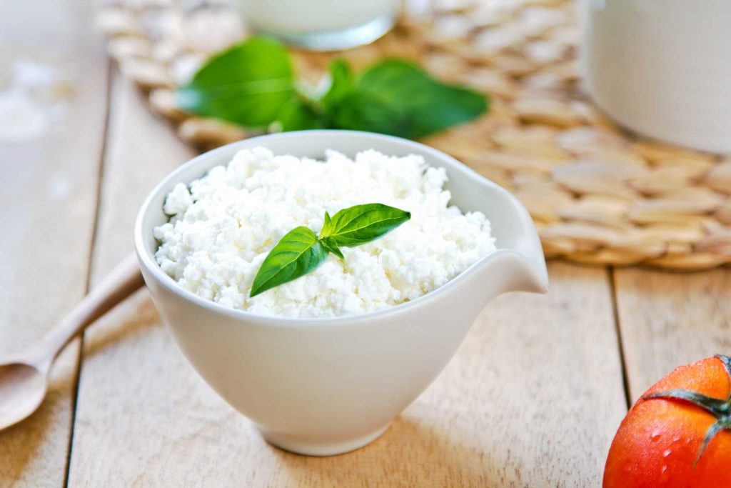 Bowl of home made Ricotta Cheese with a garnish on top | Featured image for What is Ricotta Cheese blog for Fresco Cheese.